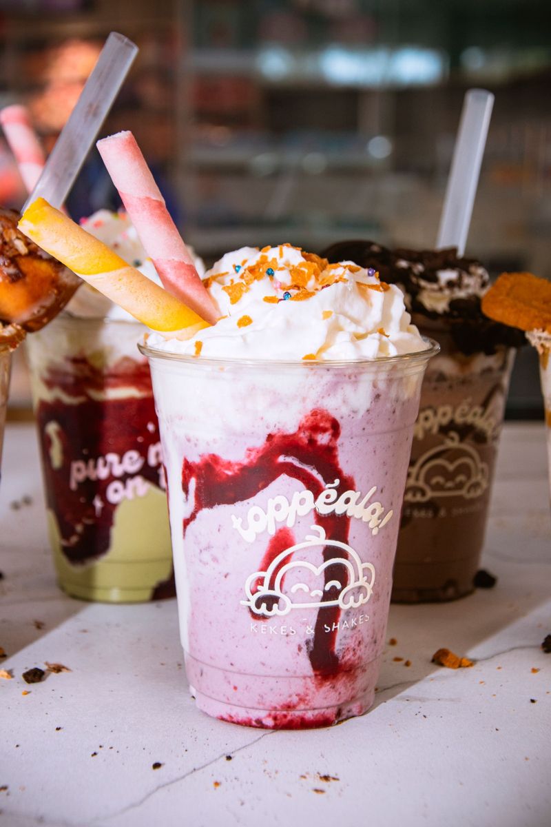 Thick shakes with whipped cream and chocolate sauce